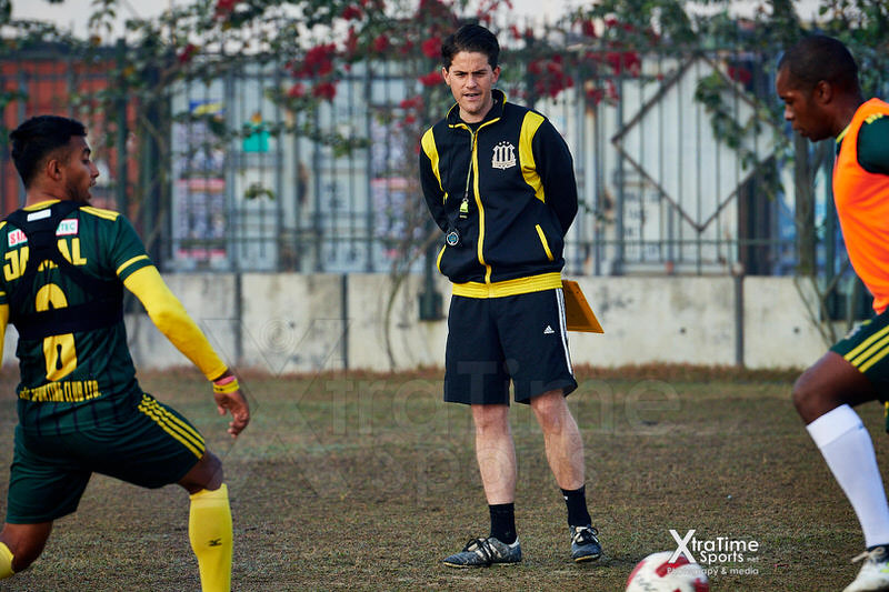 Coach McKinstry works with players in training (Bangladesh, 2018)